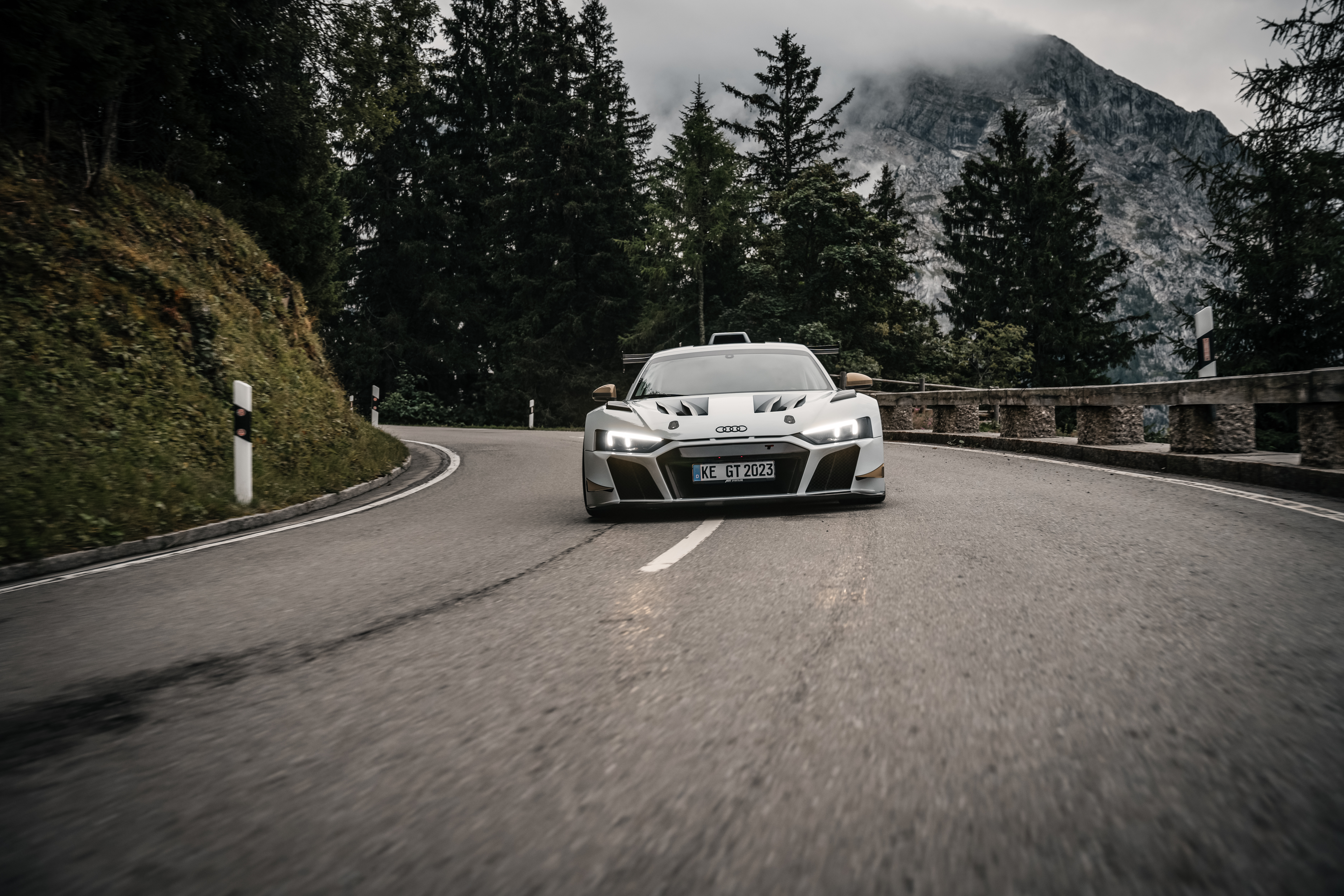 Black and white XGT from the front view when driving on the road 